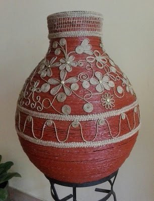 carboy decorated with rope