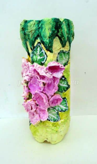 vase with flowers from a plastic bottle