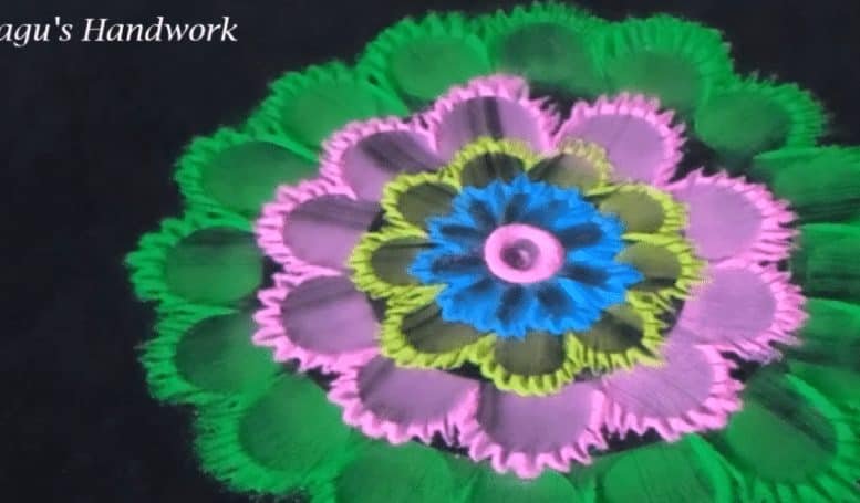 Free hand flower rangoli making