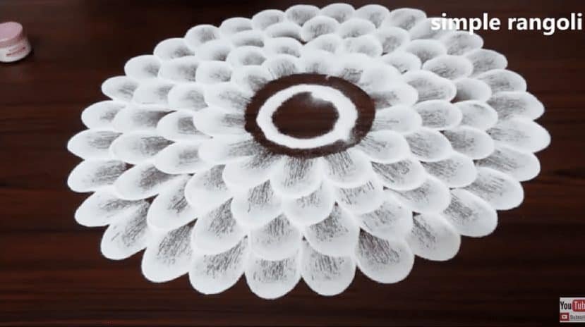 How to make beautiful flower rangoli in 2 minutes