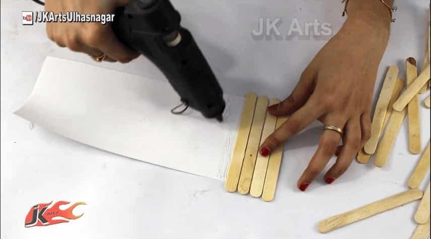 Pen stand and mobile phone holder with ice-cream sticks 