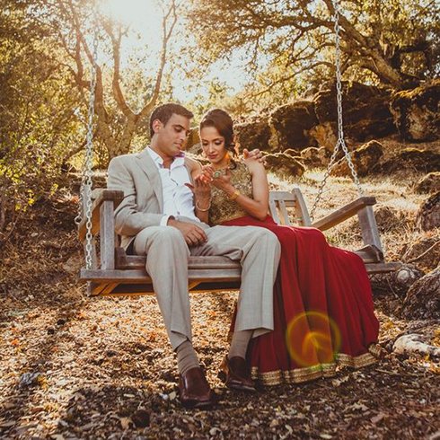 Photo of A couple poses for an outdoor pre wedding shoot