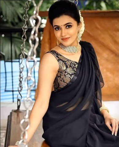 Black Saree with contrast blouse design